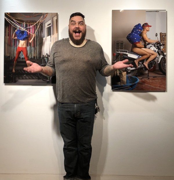 Izzy Berdan poses next to his "Amurqa" series